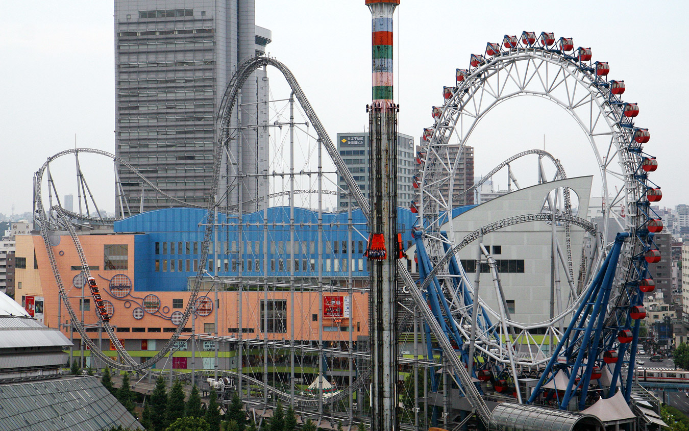 Thunder Dolphin At The Tokyo Dome City Attractions Amusement Park Tokyo Japan Which Passes Through Both A Hole In T Tokyo Dome Roller Coaster Amusement Park